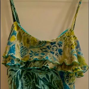 Slimming, lightweight & layered camisole.  Pair it with jeans & turn heads!